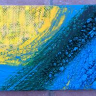 Building up texture with the medium and using tools for marking.